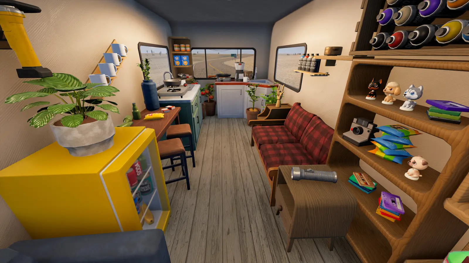 Nomad Drive RV kitchen with stove, coffee maker, fridge and sofa
